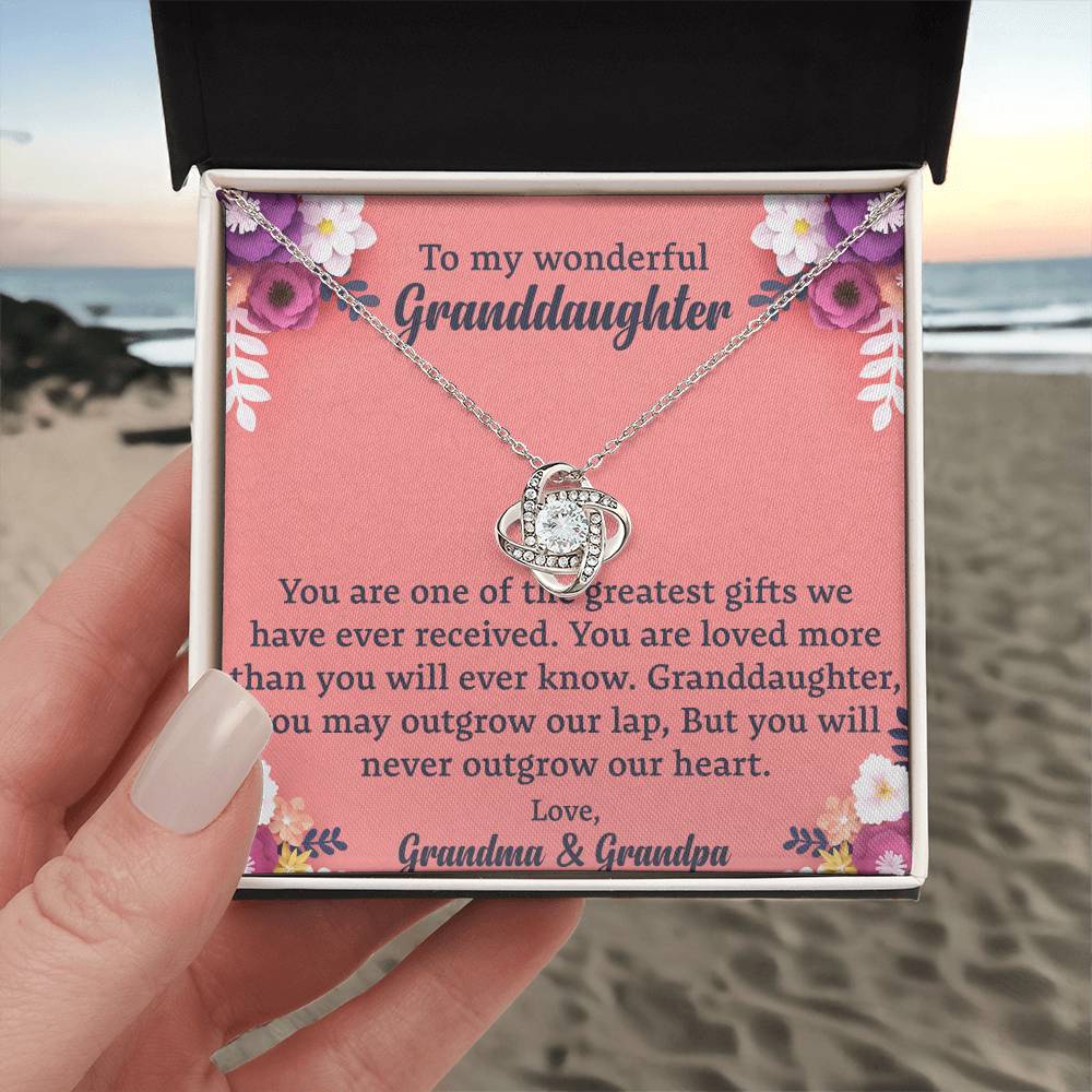 To My Granddaughter "You Will Never Outgrow Our Heart" Knot Necklace